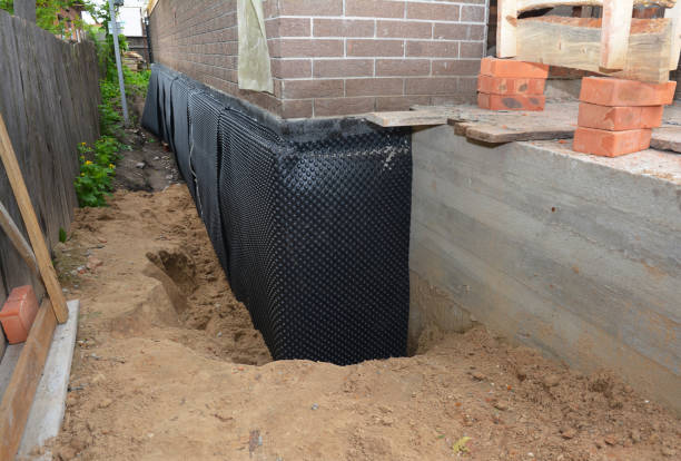Happy homeowners after waterproofing job in Springboro